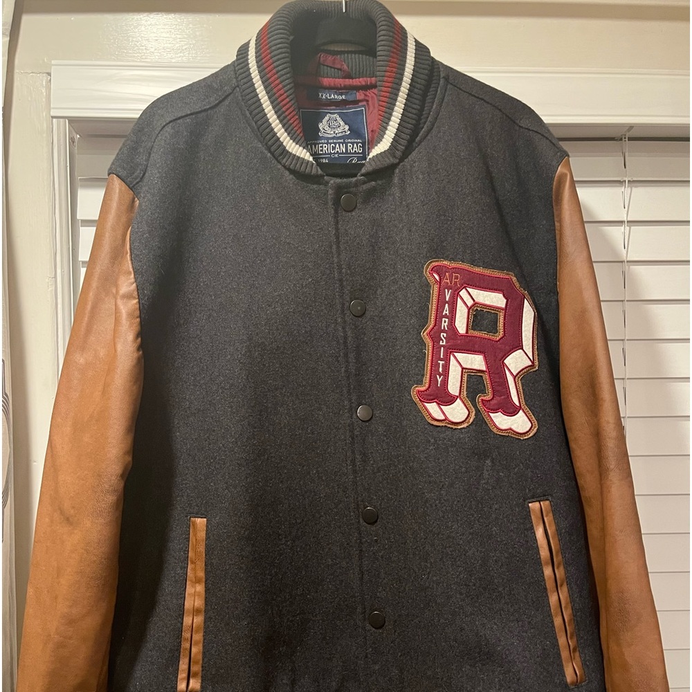 Brand: American Rag used varsity jacket.